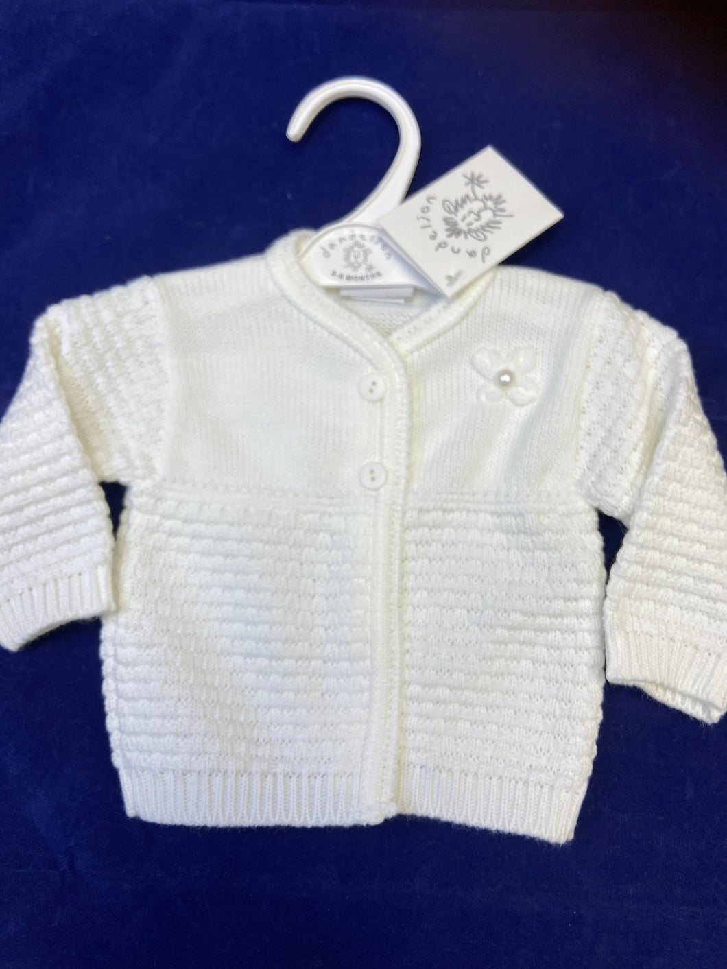 Milky white baby girls cardigan with flower detail